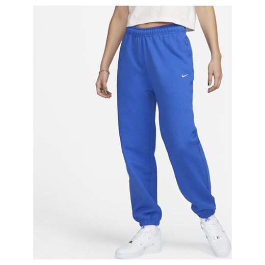 Damskie spodnie z dzianiny Nike Solo Swoosh - Niebieski Nike M Nike poland