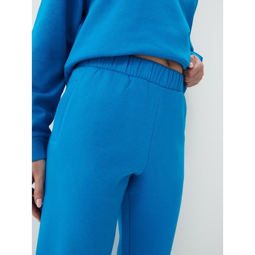 Mohito - Niebieskie spodnie dresowe - Turkusowy Mohito XL Mohito