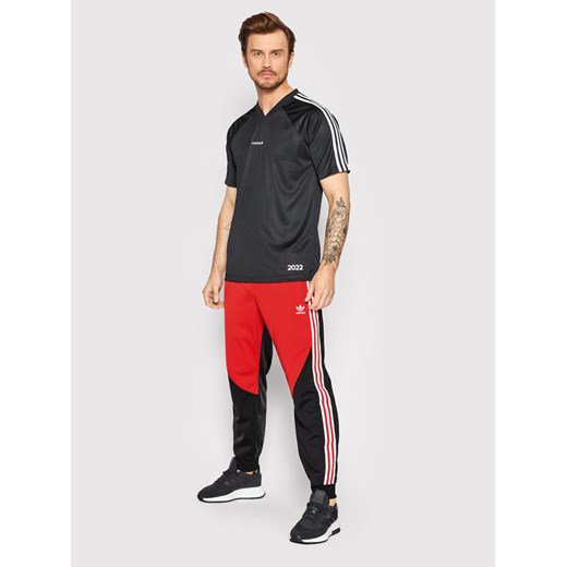 adidas Spodnie dresowe Sst Blocked Track HC2078 Czarny Regular Fit S okazyjna cena MODIVO