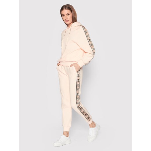Guess Spodnie dresowe V2RB05 KA3P1 Pomarańczowy Regular Fit Guess L okazja MODIVO