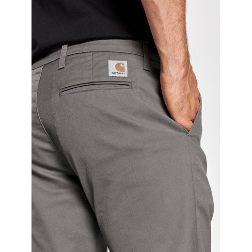 Carhartt WIP Spodnie materiałowe Sid I003367 Szary Slim Tapered Fit 30_32 wyprzedaż MODIVO