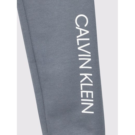 Calvin Klein Jeans Spodnie dresowe Institutional Logo IB0IB00954 Szary Regular 12Y MODIVO okazyjna cena