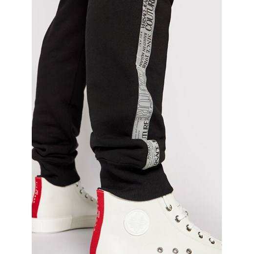 Versace Jeans Couture Spodnie dresowe Tape Logo 71GAA3B7 Czarny Regular Fit XL promocyjna cena MODIVO