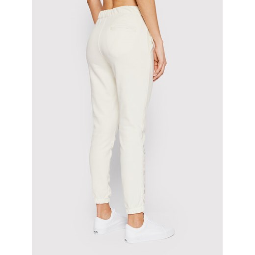 Converse Spodnie dresowe 10022979-A06 Beżowy Regular Fit Converse XL okazja MODIVO