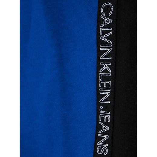 Calvin Klein Jeans Spodnie dresowe Colour Block IB0IB00866 Niebieski Regular Fit 12Y MODIVO okazja