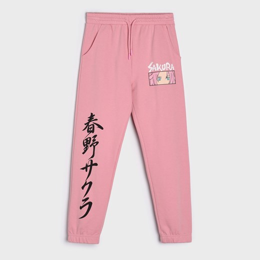 Sinsay - Spodnie dresowe jogger Naruto - Różowy Sinsay 146 Sinsay