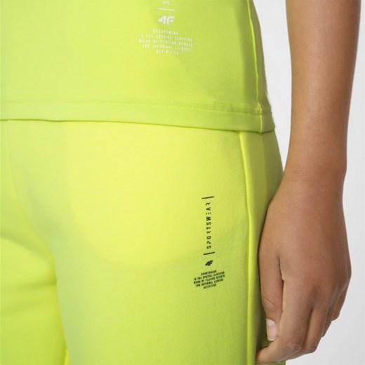 Damskie spodnie dresowe joggery 4F H4Z22-SPDD012 - żółte L wyprzedaż Sportstylestory.com