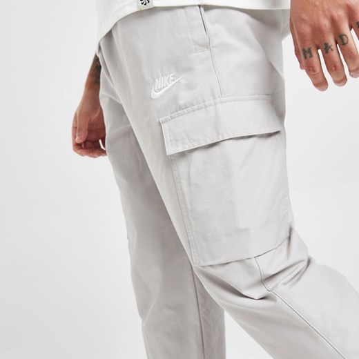 NIKE BLUZA PLAYER WVN PANT LT ORE PANTS BEZOWY DX2033-012 Nike L JD Sports