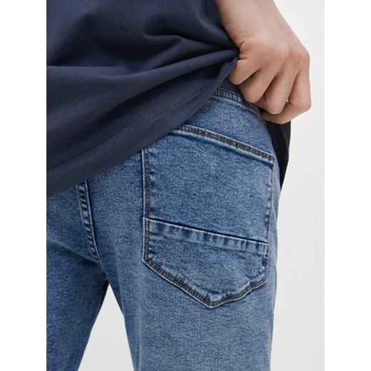 Jeansy skinny fit z regularnym stanem niebieskie - Niebieski House 32/34 House