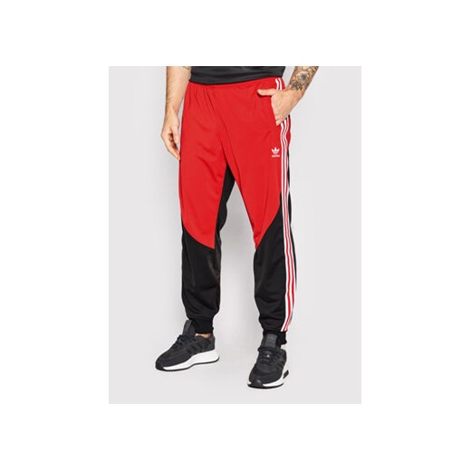 adidas Spodnie dresowe Sst Blocked Track HC2078 Czarny Regular Fit S MODIVO promocja