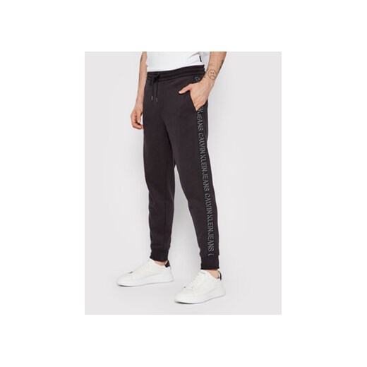 Calvin Klein Jeans Spodnie dresowe J30J318595 Czarny Regular Fit XL MODIVO okazyjna cena