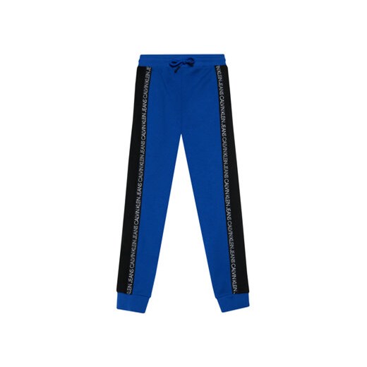 Calvin Klein Jeans Spodnie dresowe Colour Block IB0IB00866 Niebieski Regular Fit 12Y promocyjna cena MODIVO