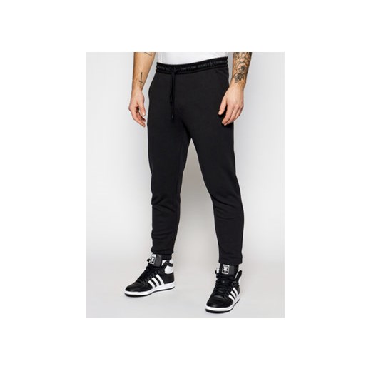 Calvin Klein Jeans Spodnie dresowe J30J317196 Czarny Regular Fit S okazja MODIVO