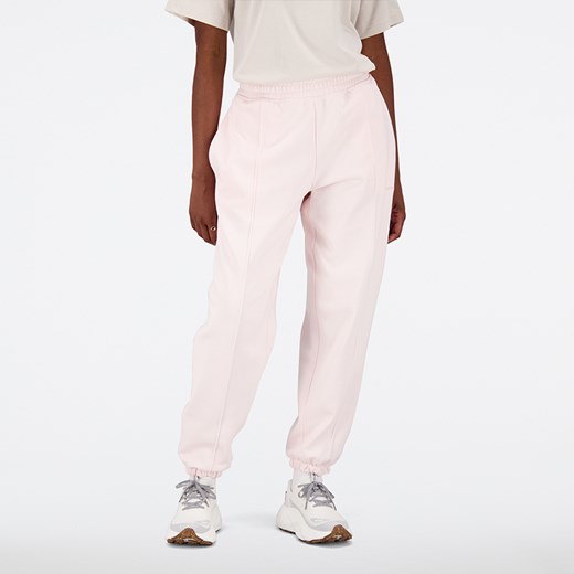 Spodnie damskie New Balance WP23553WAN – różowe ze sklepu New Balance Poland w kategorii Spodnie damskie - zdjęcie 152709900