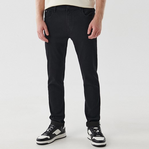 Cropp - Gładkie czarne jeansy skinny - Czarny Cropp 30/32 Cropp