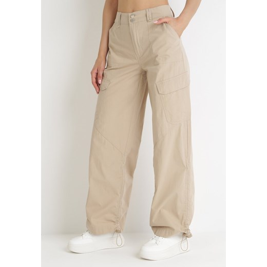 Beżowe Bawełniane Spodnie ze Stoperami na Krawędziach Nogawek Lile ze sklepu Born2be Odzież w kategorii Spodnie damskie - zdjęcie 154078322
