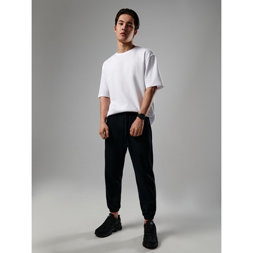 Sinsay - Spodnie dresowe jogger - Czarny Sinsay XS Sinsay