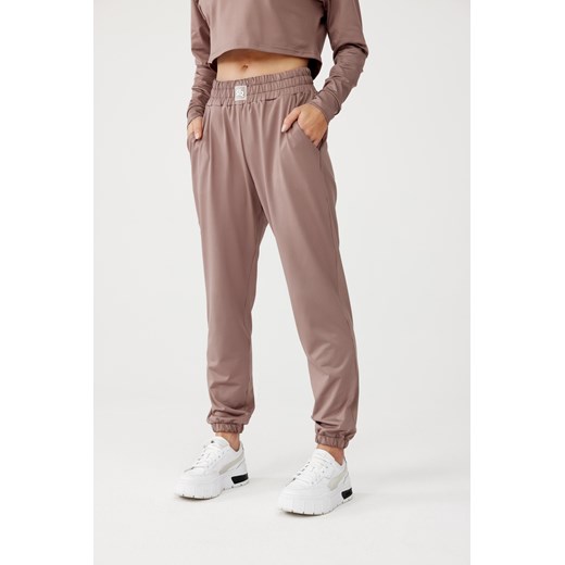Damskie spodnie dresowe OLIMP SWEAT PANTS : Kolor - Cappuccino, Rozmiar - S Rough Radical S ROUGH RADICAL