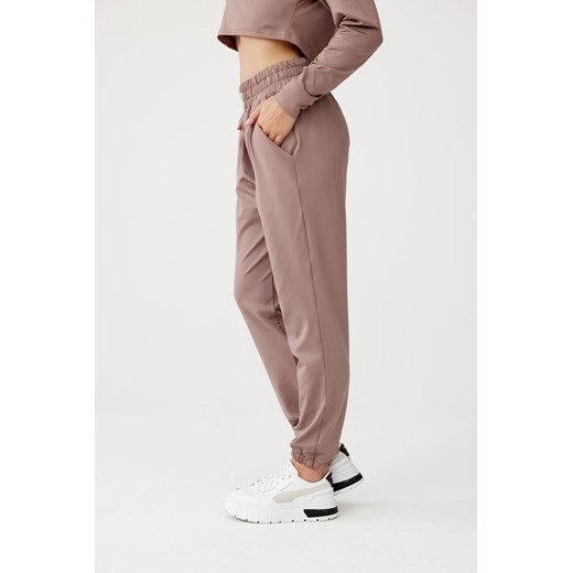 Damskie spodnie dresowe OLIMP SWEAT PANTS : Kolor - Cappuccino, Rozmiar - S Rough Radical S ROUGH RADICAL