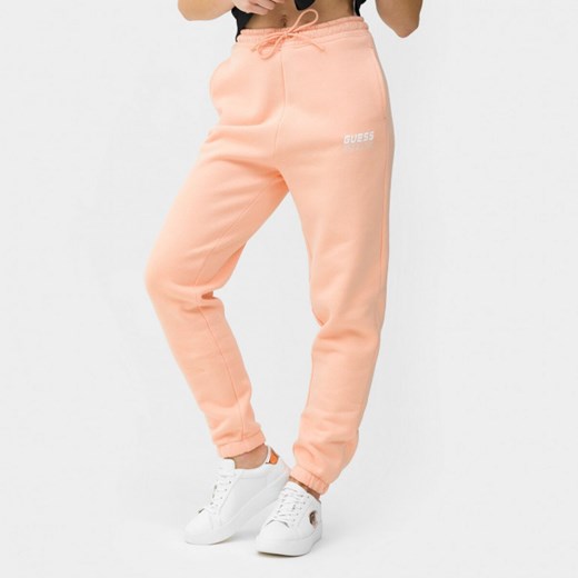 Damskie spodnie dresowe GUESS ALISHA LONG PANTS - różowe Guess L Sportstylestory.com