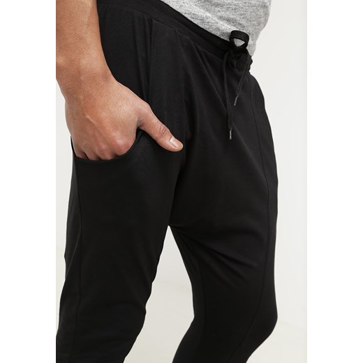 Criminal Damage DROP Spodnie treningowe black zalando czarny elastyczne