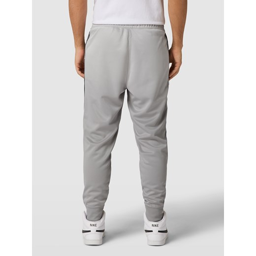 Spodnie dresowe z lampasami Nike S Peek&Cloppenburg
