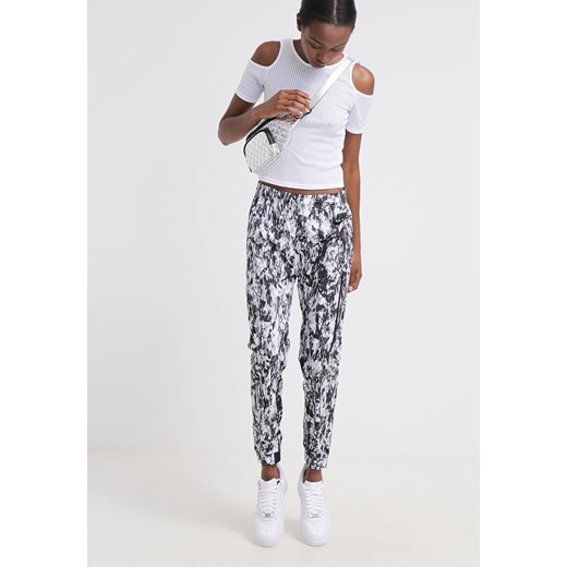 Nike Sportswear Spodnie treningowe dove grey/black zalando bialy Spodnie