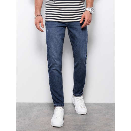 Spodnie męskie jeansowe z przetarciami REGULAR FIT - ciemnoniebieskie V4 OM-PADP-0102 ze sklepu ombre w kategorii Jeansy męskie - zdjęcie 159250870