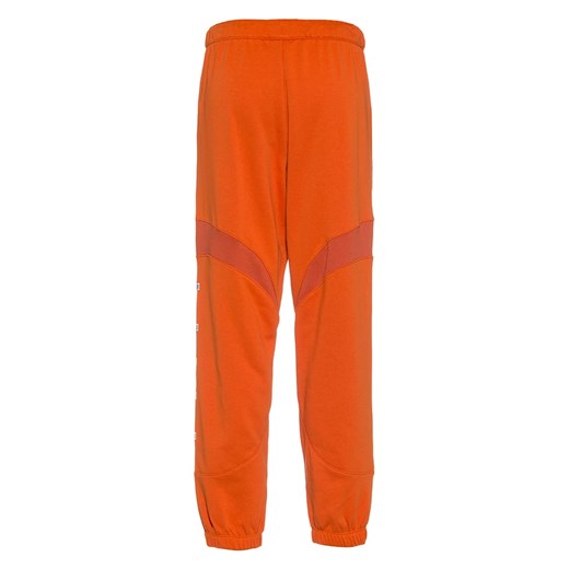 Nike Spodnie dresowe &quot;NSW Air&quot; w kolorze pomarańczowym Nike L promocja Limango Polska