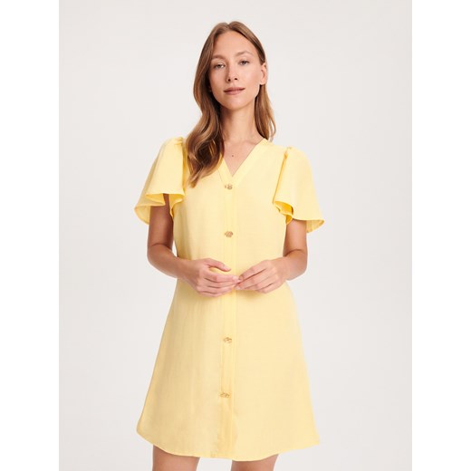 Sukienka Reserved mini żółta oversize z dekoltem w serek 