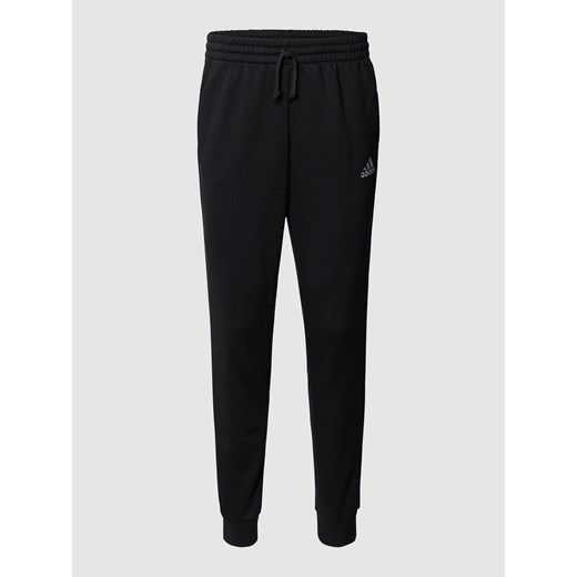 Spodnie dresowe z paskami z logo Adidas Sportswear XS Peek&Cloppenburg 