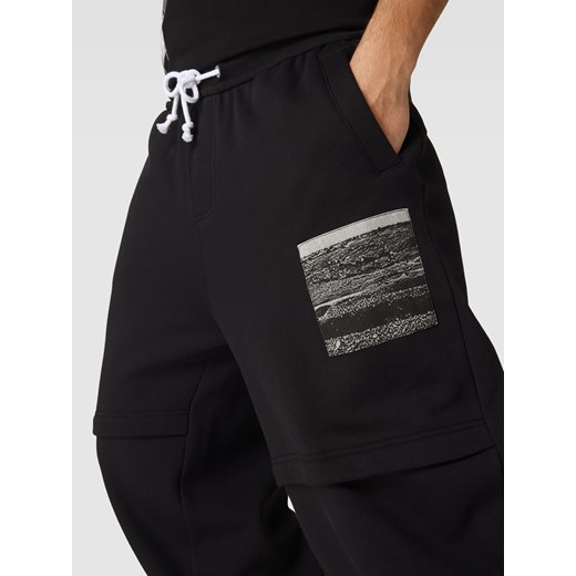 Spodnie męskie czarne Calvin Klein w sportowym stylu dresowe 
