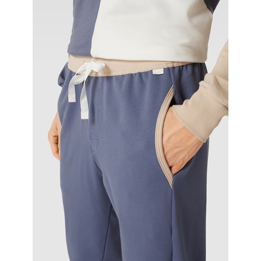 Spodnie dresowe z detalami w kontrastowym kolorze Calida XL Peek&Cloppenburg 