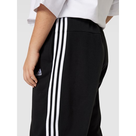Spodnie dresowe PLUS SIZE z wyhaftowanym logo Adidas Sportswear Plus 4XL Peek&Cloppenburg 
