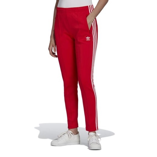 Spodnie  dresowe adidas Originals Primeblue SST Track HF1992 - czerwone ze sklepu streetstyle24.pl w kategorii Spodnie damskie - zdjęcie 161030332