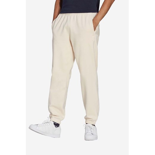 adidas Originals spodnie dresowe Premium Essentials Jogger "Wonder White" kolor beżowy gładkie HB7500-KREMOWY ze sklepu PRM w kategorii Spodnie męskie - zdjęcie 161407371
