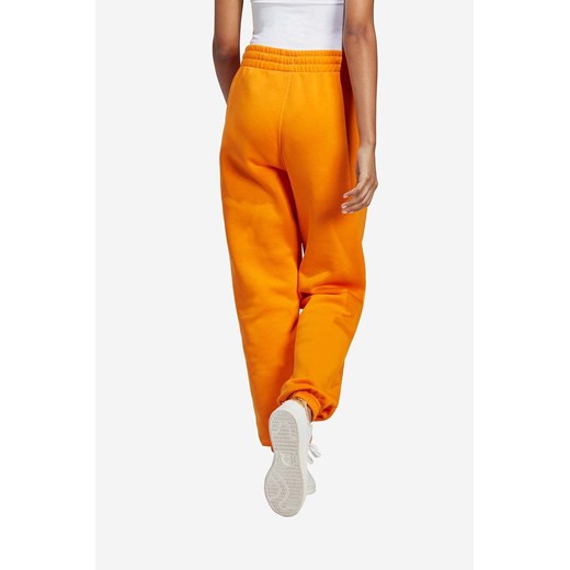 adidas Originals spodnie dresowe bawełniane kolor pomarańczowy gładkie 38 promocja PRM