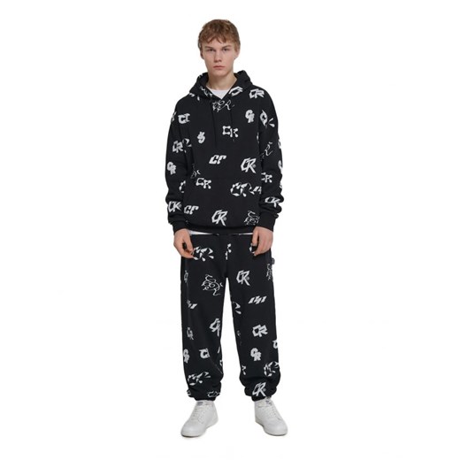 Cropp - Czarne joggery w białe wzory - czarny Cropp XL promocja Cropp