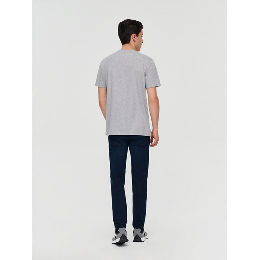 Ciemnogranatowe spodnie jeansowe slim fit - Niebieski House 28/30 House