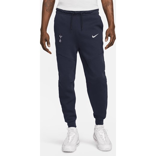 Joggery męskie Nike Tottenham Hotspur Tech Fleece - Niebieski ze sklepu Nike poland w kategorii Spodnie męskie - zdjęcie 161519672