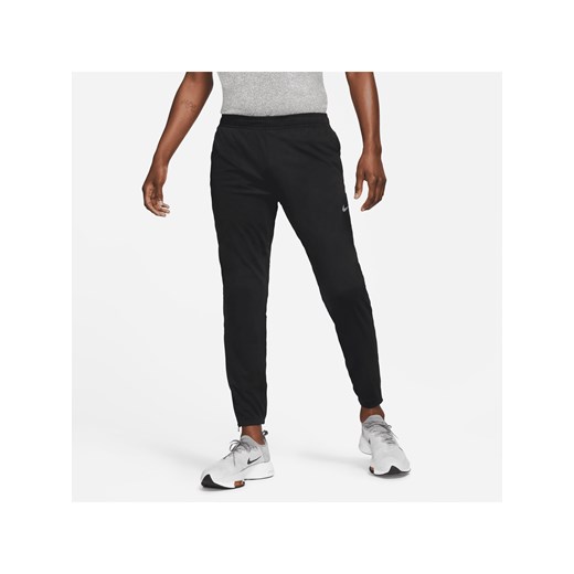 Męskie spodnie do biegania z dzianiny Nike Dri-FIT Challenger - Czerń ze sklepu Nike poland w kategorii Spodnie męskie - zdjęcie 161521690
