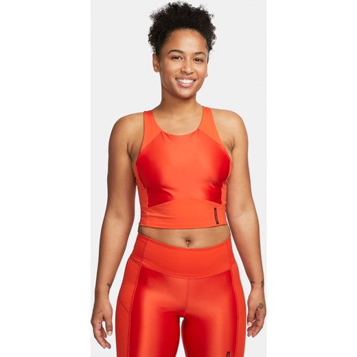 Damska koszulka o skróconym kroju bez rękawów Nike Pro Dri-FIT - Czerwony ze sklepu Nike poland w kategorii Bluzki damskie - zdjęcie 161523221
