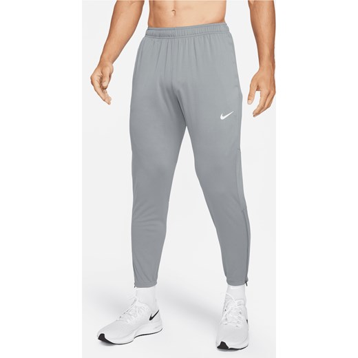 Męskie spodnie do biegania z dzianiny Nike Dri-FIT Challenger - Szary ze sklepu Nike poland w kategorii Spodnie męskie - zdjęcie 161525833