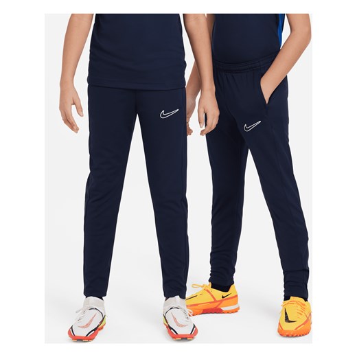 Dziecięce spodnie piłkarskie Nike Dri-FIT Academy23 - Niebieski ze sklepu Nike poland w kategorii Spodnie chłopięce - zdjęcie 161526613