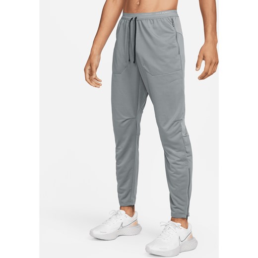 Męskie spodnie do biegania z dzianiny Nike Phenom Dri-FIT - Szary ze sklepu Nike poland w kategorii Spodnie męskie - zdjęcie 161527071