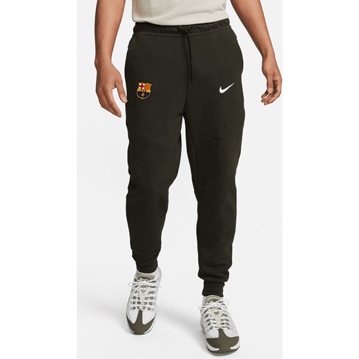 Męskie joggery Nike FC Barcelona Tech Fleece - Zieleń ze sklepu Nike poland w kategorii Spodnie męskie - zdjęcie 161527382
