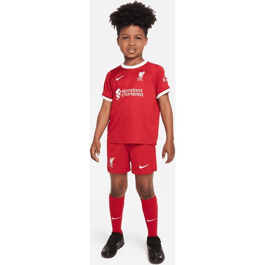 Trzyczęściowy strój dla małych dzieci Nike Dri-FIT Liverpool F.C. 2023/24 (wersja domowa) - Czerwony ze sklepu Nike poland w kategorii Komplety chłopięce - zdjęcie 161527544