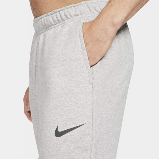 Męskie zwężane spodnie do fitnessu z dzianiny Dri-FIT Nike Dry - Szary Nike M Nike poland