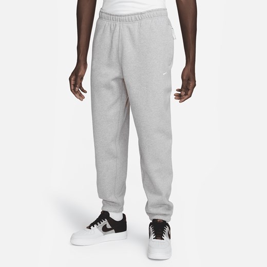 Męskie spodnie z dzianiny Nike Solo Swoosh - Szary Nike L Nike poland