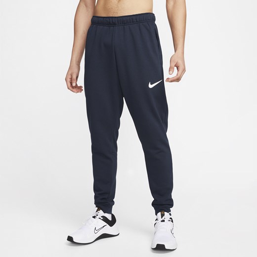 Męskie zwężane spodnie do fitnessu z dzianiny Dri-FIT Nike Dry - Niebieski Nike L Nike poland